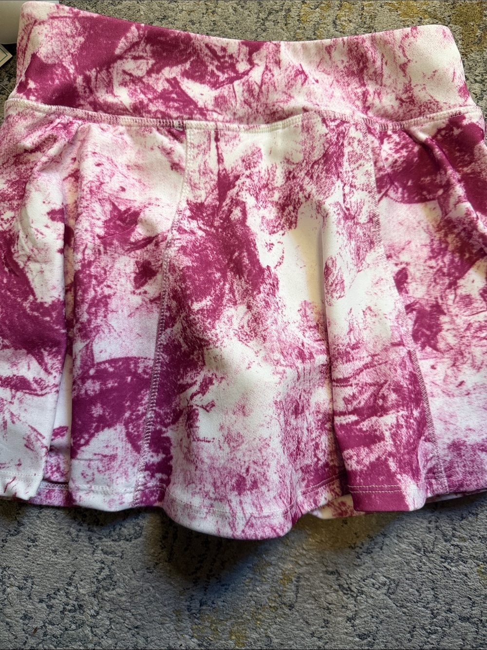 Women’s Pink Marble Print Pleated Mini Skirt with shorts underneath!